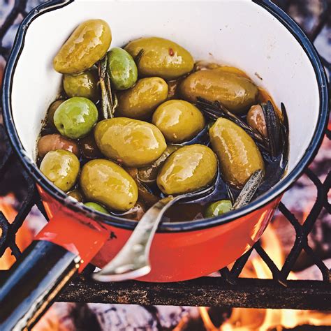 Freakishly Delicious Olives Warmed By The Fire Recipe Epicurious