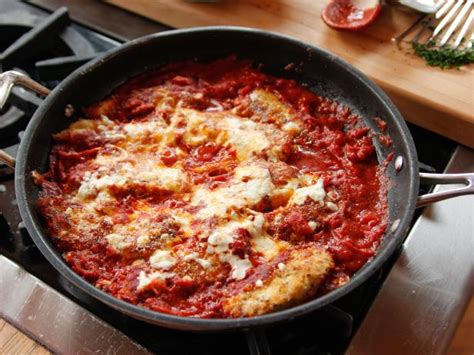 Heat butter and olive oil over high heat in a large skillet. Lighter Chicken Parmesan Recipe | Ree Drummond | Food Network