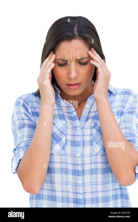 Woman With A Headache Rubbing Her Temples Stock Photo Alamy