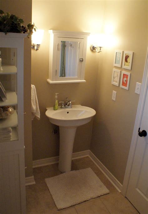 Note the slight incline of the tile that helps water drain. Jessie Street Designs: My Main Bathroom