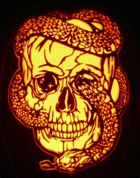 Skull And Snake Hand Carved On A Foam Pumpkin By