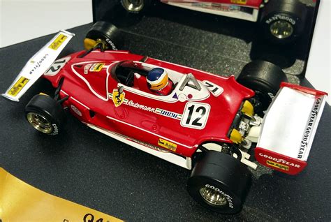 Quartzoferrari312t2carlosreutemanwinnerbrazilgp19772 Minichamps