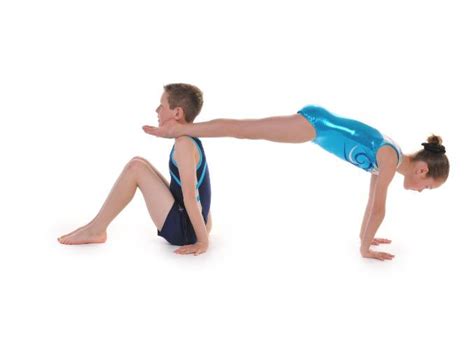 Pair And Trio Gymnastics Front And Back Support Balances By Head Over
