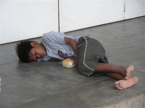 Homeless Child On The Streets Of Cambodia Note That Someone Had Left