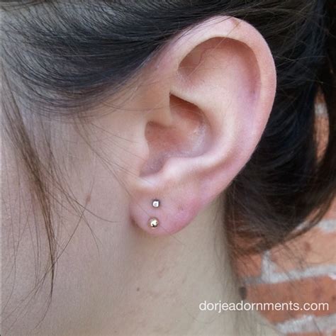 Earlobe Piercing With Gold Stud