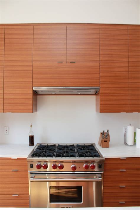 Picking custom cabinets over nonspecific locally acquired partners won't just modernize your cooking space, additionally will enhance your home, and make it dependable and more aggressive in the market. The Modern, Ribbon-Striped Sapel Kitchen Design in ...