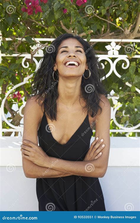Laughing Latin American Woman Outdoors With Arms Crossed Stock Image Image Of Crossed