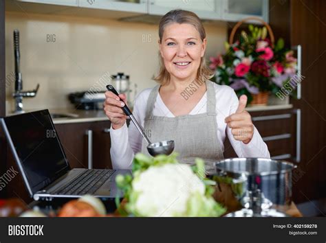Mature Woman Kitchen Image And Photo Free Trial Bigstock