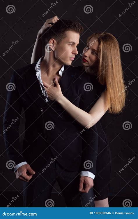 A Girl During A Passionate Embrace Clung To The Hair Of Her Man Stock