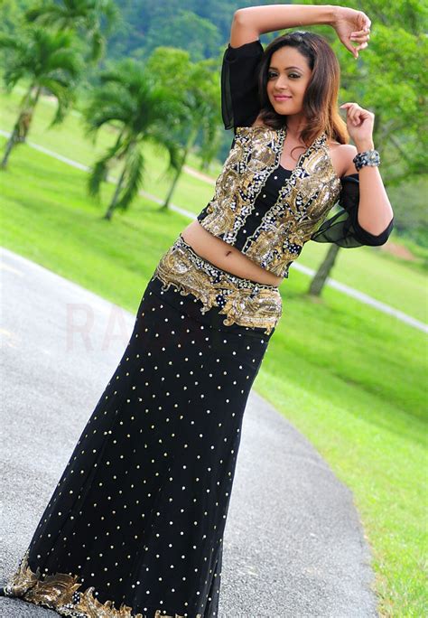 Bhavana Gorgeous Looks In Long Black Skirt Photos