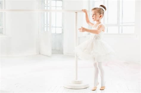 Free Photo Little Ballerina Girl In A Tutu Adorable Child Dancing