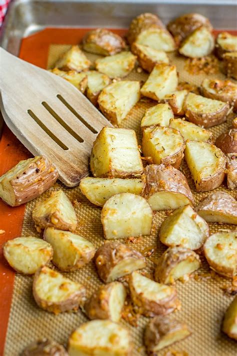 After you make these potatoes this way, it just may become your most favorite way to make them ever too. Parmesan Herb Crusted Red Potatoes - Nourish and Fete