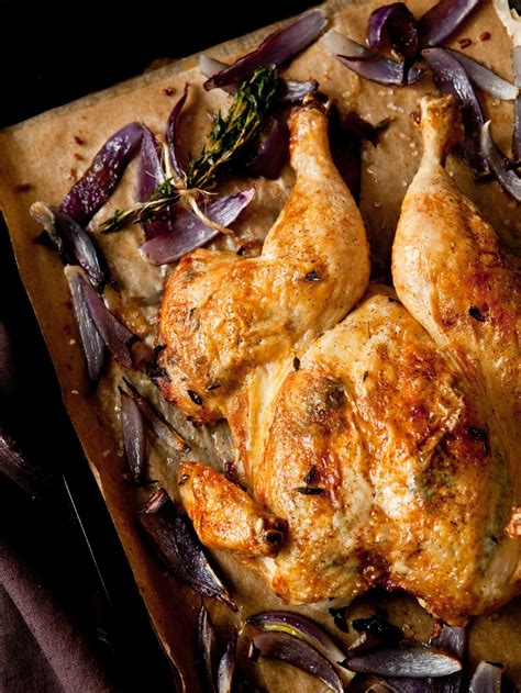 Bake in preheated oven for 15 minutes, then flip the chicken. Butterflied Roast Chicken with Red Onions- Deliciously Organic