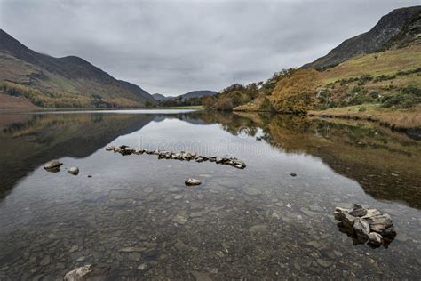 Stuning Autumn Fall Landscape Image Of Lake Buttermere In Lake D Stock