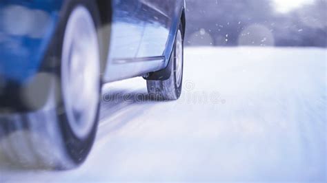 Blue Car With Winter Tires On The Snowy Road Drive Safe Space For