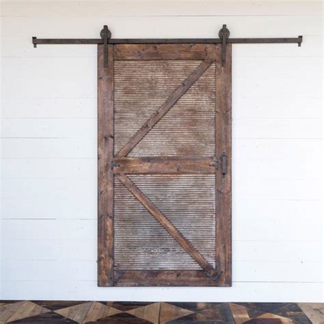 Have you been dreaming of a relaxing vacation in the french countryside? Park Hill Sliding Barn Door With Rails - Iron Accents