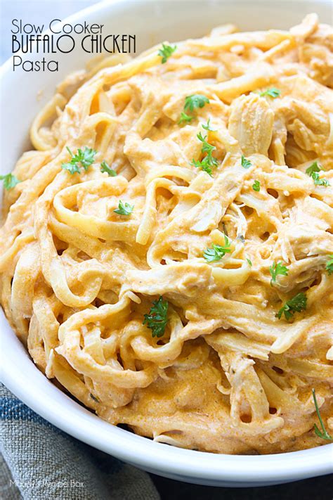 A slow cooker takes much of the work out of cooking more involved meals, and chicken is the most popular and affordable kind of meat out there. Slow Cooker Buffalo Chicken Pasta | Mandy's Recipe Box