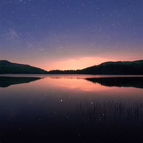 Long Exposure Photograph Of A Lake And Sky Late After Sunset Coucher