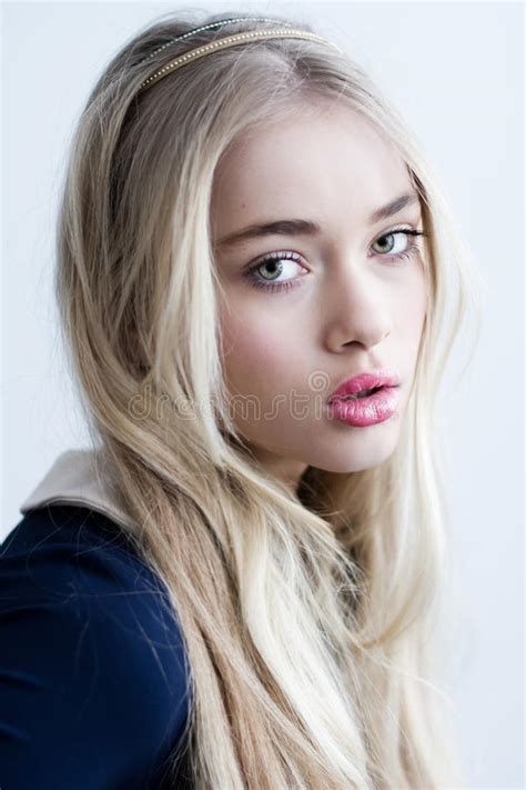 Beautiful Blonde Girl With Long Hair And Green Eyes Stock Photo Image