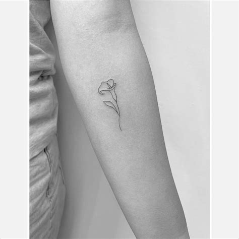 Fine Line Calla Lily Tattoo On The Inner Forearm