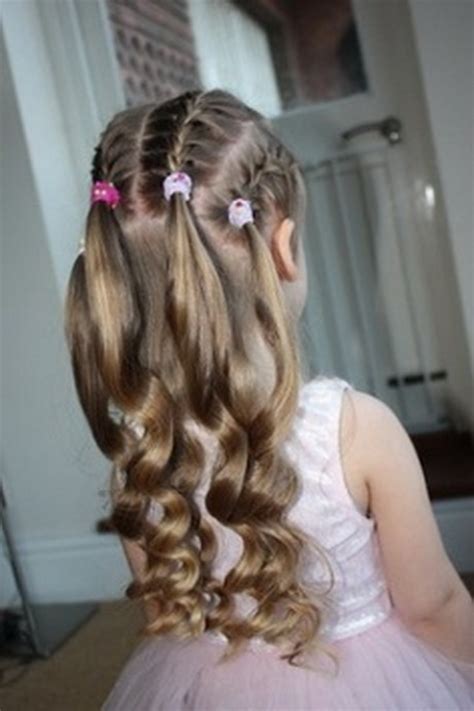 The top knot should take you two minutes to do. Hairstyles for kids with long hair