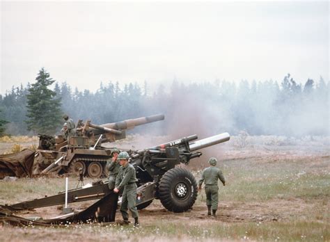 Us Army Artillery Crews Conduct A Firing Exercise With An M114 155 Mm