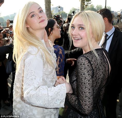 Elle Fanning Shares A Hug With Her Grandfather As She Starts The New