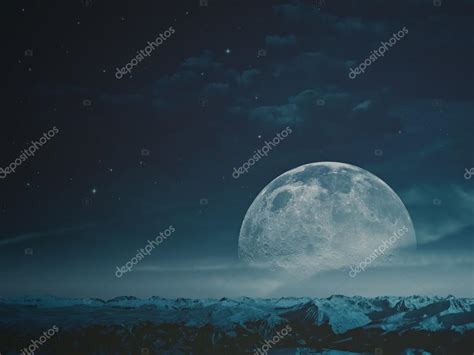 Moon Over Snowy Mountains — Stock Photo © Tolokonov 87592510