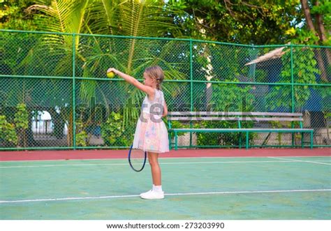 Little Girl Playing Tennis On Court Stock Photo 273203990 Shutterstock