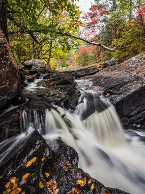 Water From The York River Flowing Over Waterfalls During Autumn In