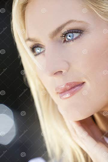 Portrait Of Beautiful Blond Woman With Blue Eyes Stock Photo Image Of