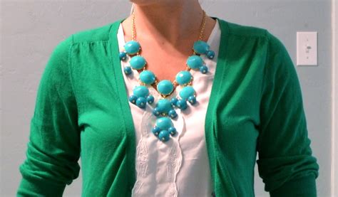 outfit post kelly green cardigan teal necklace