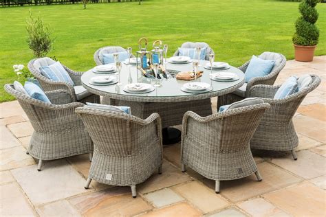Have a big dinner for close friends. Maze Rattan - Oxford 8 Seat Round Dining Set With Round Chairs | The Clearance Zone