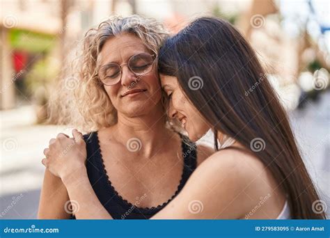 Two Women Mother And Daughter Hugging Each Other At Street Stock Image Image Of Standing