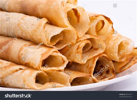 Detail Of Rolled Crepes On White Background Stock Photo