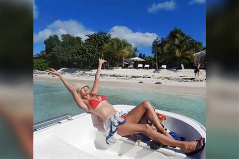 Christie Brinkley 65 Flaunts Chiseled Abs In Red Hot Bikini