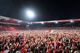 Union Berlin fans storm pitch to celebrate first ever promotion to ...