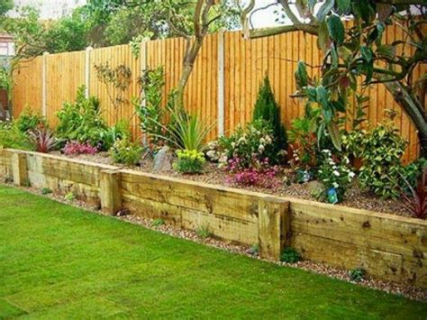 Other people choose to make their own flower bed fences with landscaping timbers, driftwood or other materials. Privacy fence/Raised flower beds | gates/fences | Pinterest