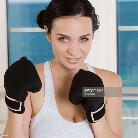 Portrait Of A Young Woman Practicing Boxing High Res Stock Photo