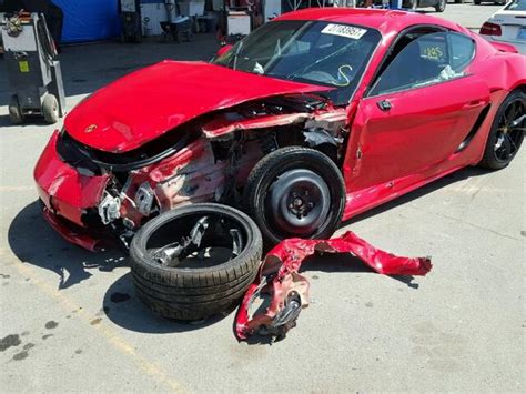 Totaled Guards Red Porsche 718 Cayman With 1885 Miles Shows Up In