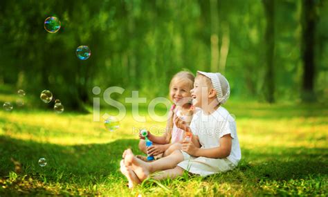 Children Blowing Bubbles Stock Photo Royalty Free Freeimages