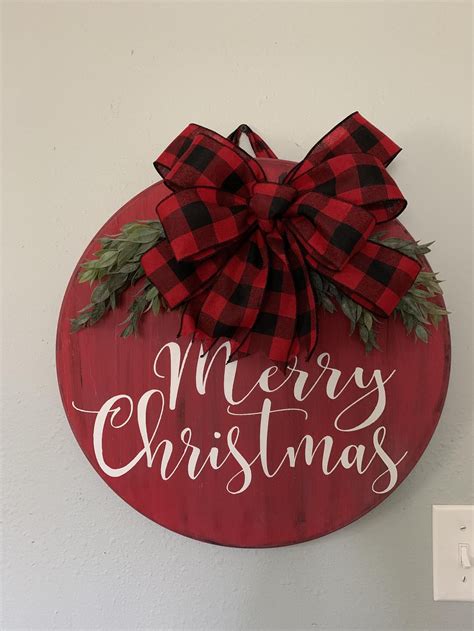 Merry Christmas Wood Door Hanger With Greenery And Buffalo Plaid Bow