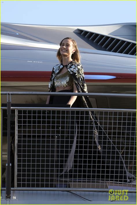 Brie Larson Wears Golden Cape To Marvel Avengers Campus Opening At