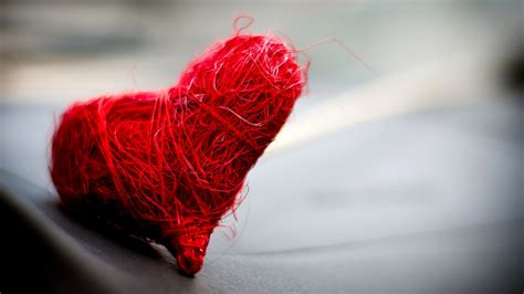 Maybe you would like to learn more about one of these? A heart made of red thread - Love wallpaper