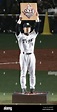 OSAKA, Japan - Hanshin Tigers' cleanup hitter Tomoaki Kanemoto holds up ...