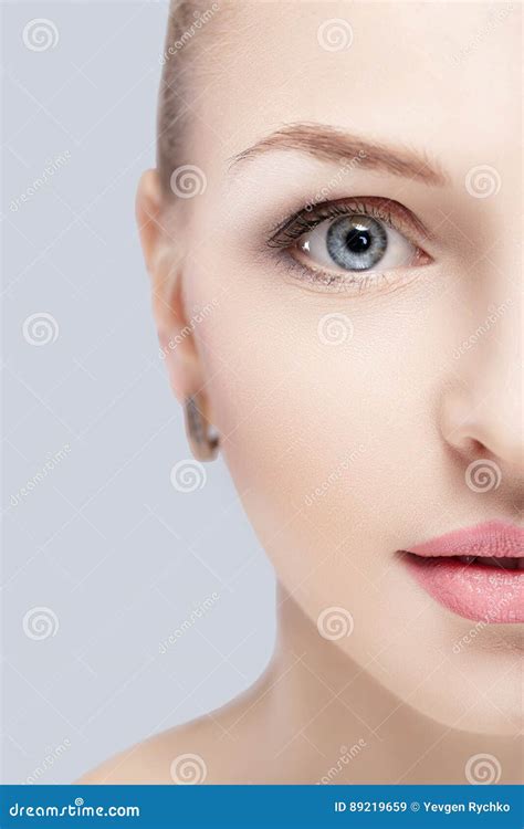 Portrait Of Beautiful Young Woman With Blue Eyes On Grey Background Closeup Girl With Clean