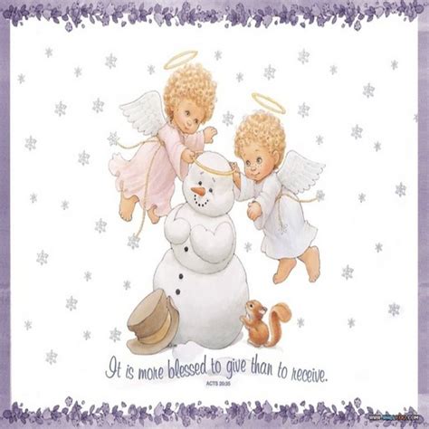 Two Angels And A Snowman In Front Of A Christmas Tree