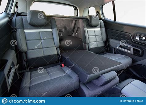 Folded Middle Seat In The Back Row Of Car Seats Stock Photo Image Of