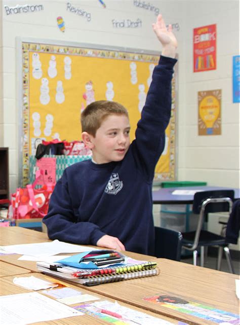 Boy Raising Hand St Ambrose School