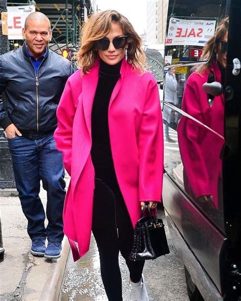 popsugar on instagram “here s jlo in a hot pink coat with a hot 💋 on